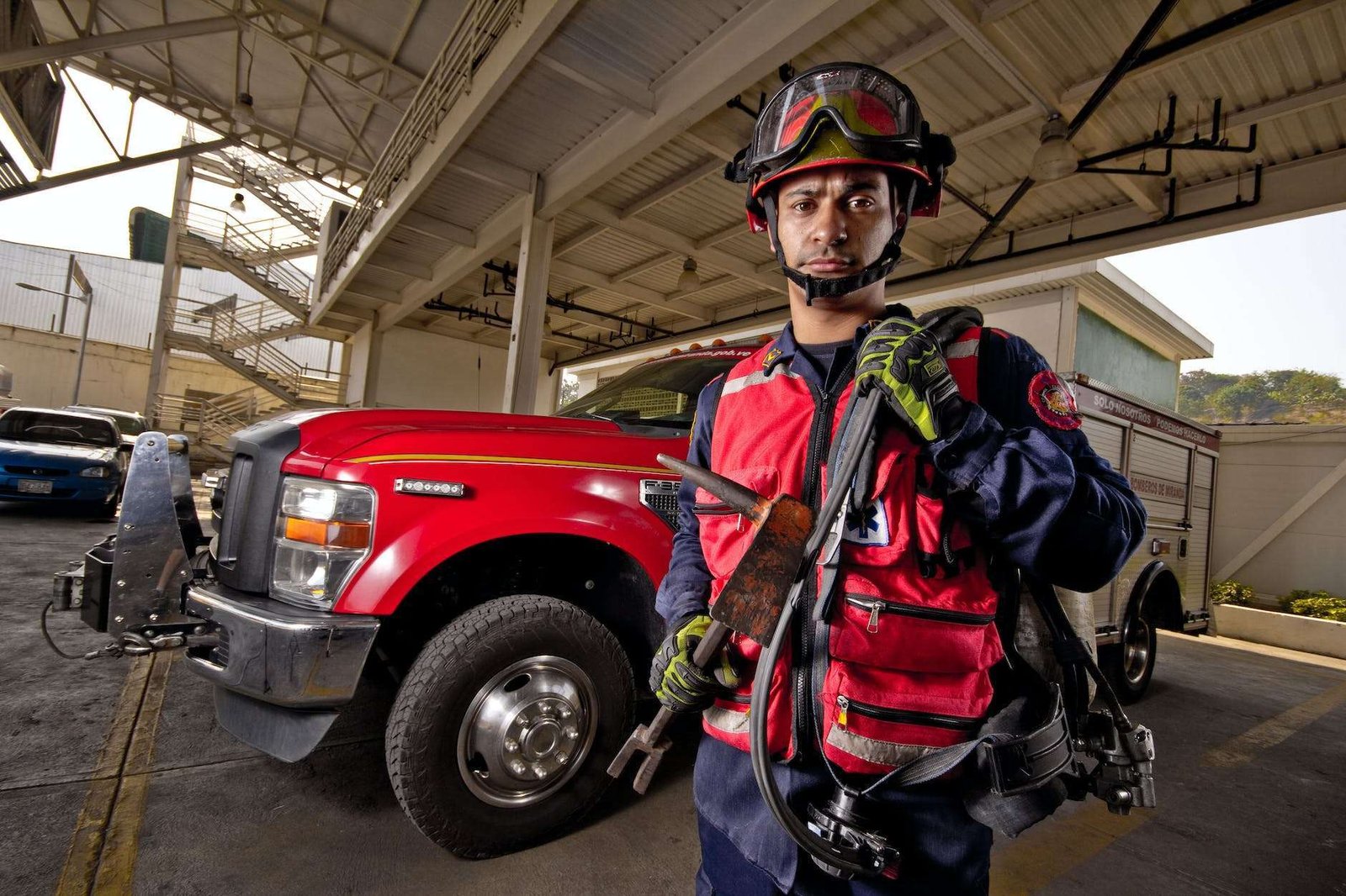 firefighter with helmet at fire station