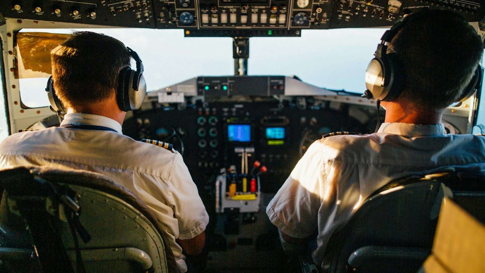 two pilots flying an airplane