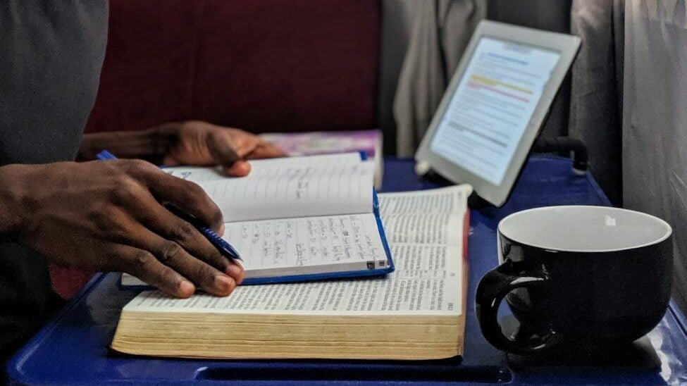 a man reading indoor