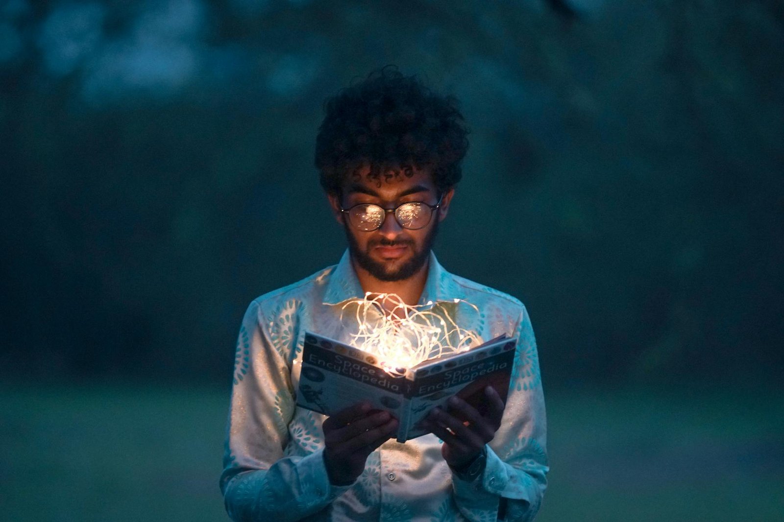 man holding book